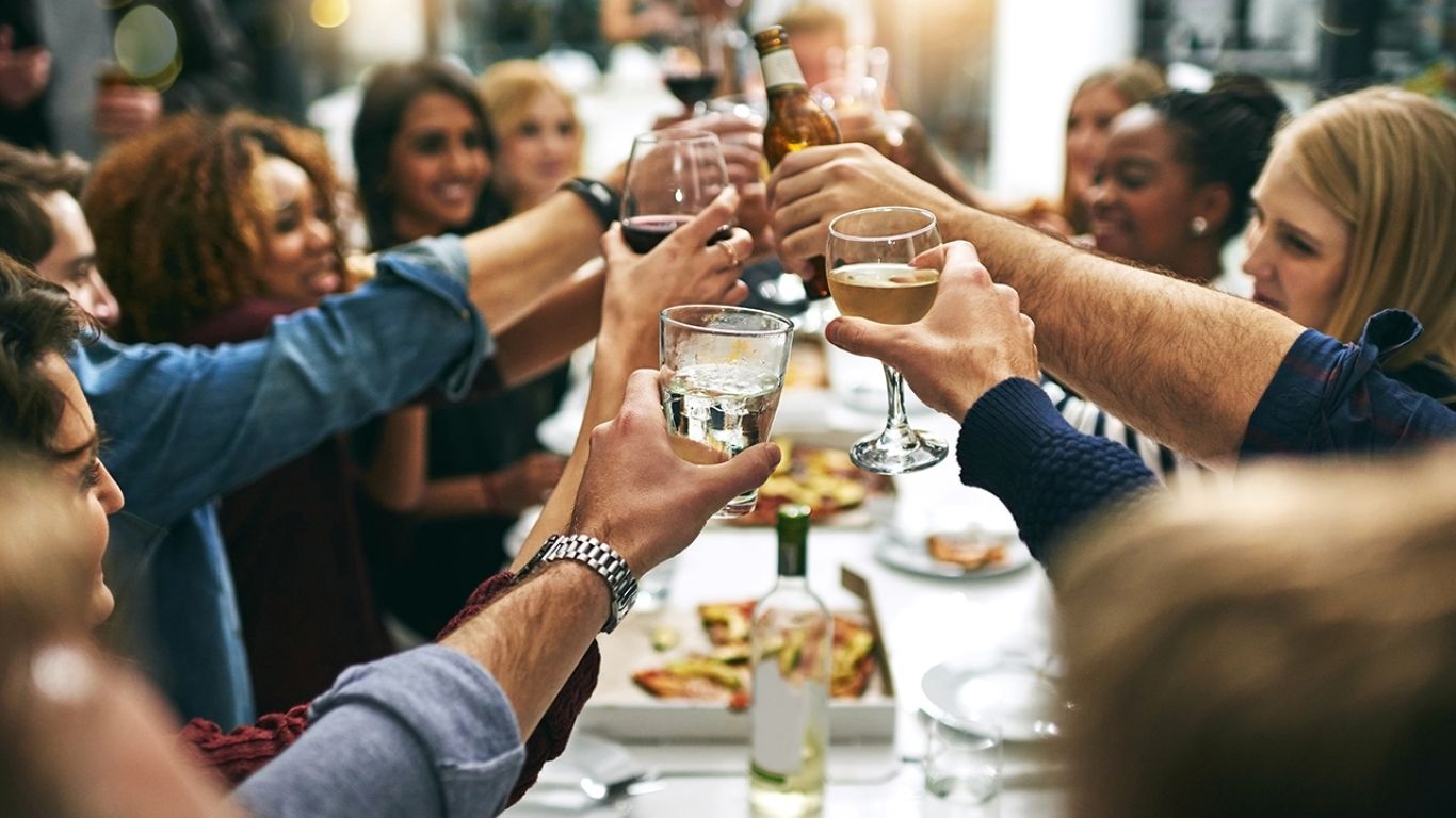 Provost friends toasting drinks