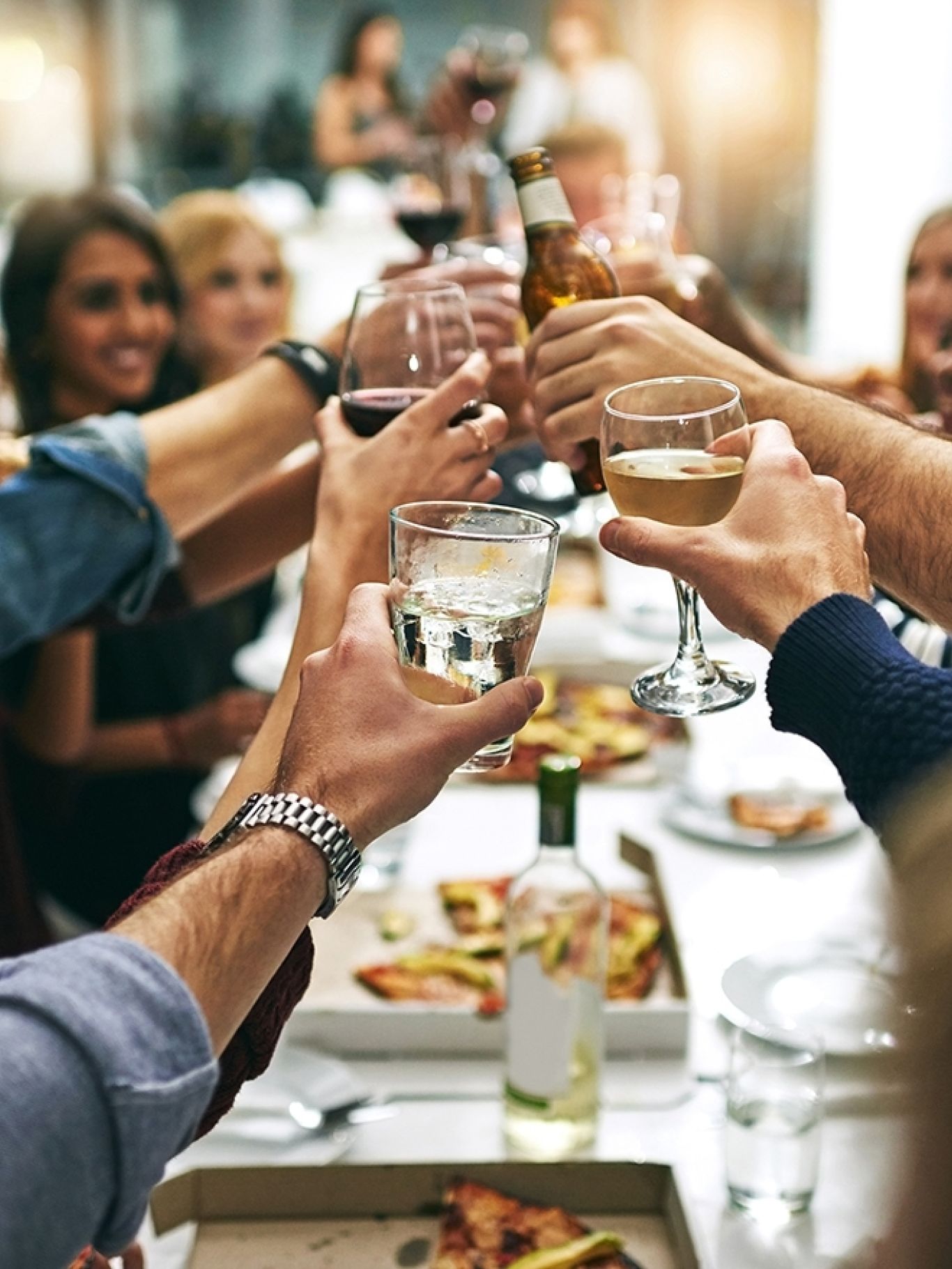 Provost friends toasting drinks